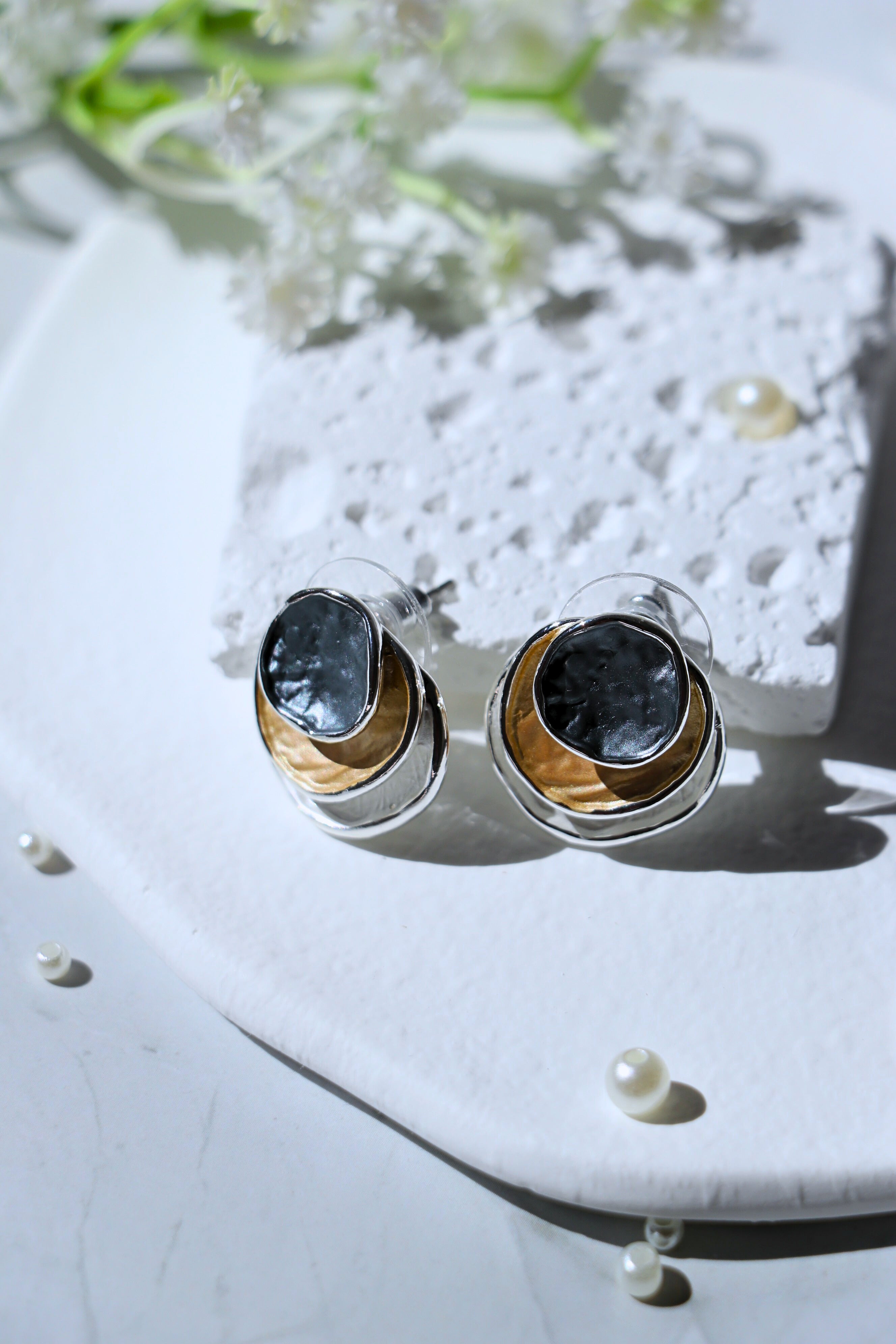 Kirana Tri Tone Earrings with dark grey, white, and gold brass and copper design, 1.5cm diameter post earrings