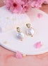 Zircon Mother of Pearl gold stud earrings with baroque freshwater pearl and cubic zircon accents