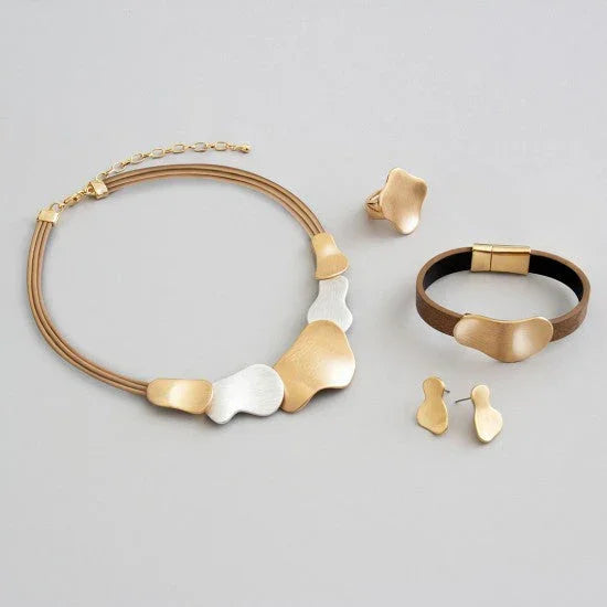 Buy Women Sterling Cuff Bracelet Australia - Contemporary gold and silver abstract jewelry set with necklace, bracelet, ring, and earrings on grey background