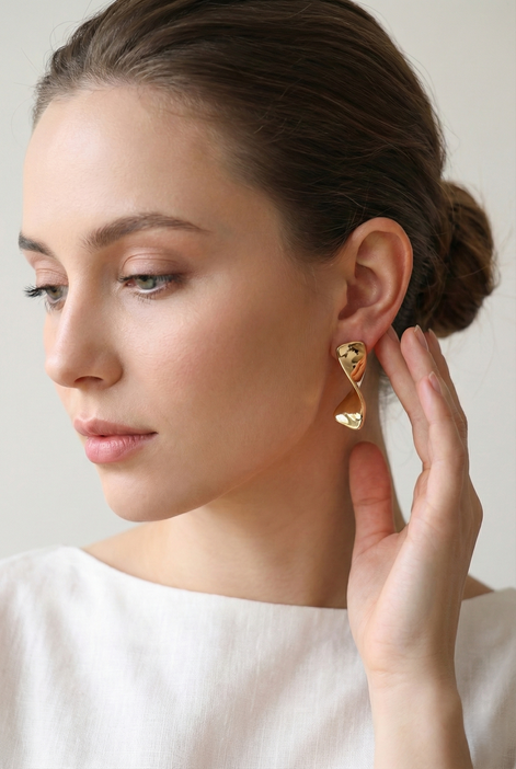 Bow Gold Earrings sleek polished bow stud earrings 31mm length 9mm width gold plated brass and copper