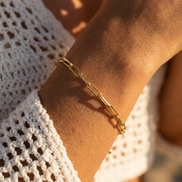 Cadena Gold Bracelet in radiant gold-toned brass with sleek polished finish, 18cm length, elegant and timeless design.
