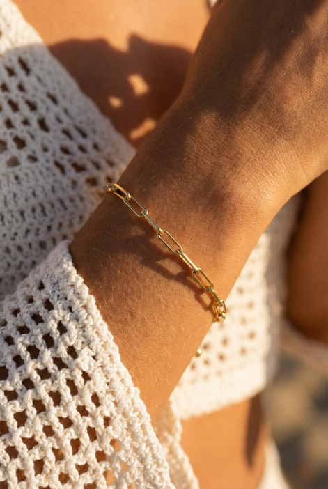 Cadena Gold Bracelet in radiant gold-toned brass with sleek polished finish, 18cm length, elegant and timeless design.