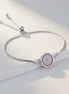 Diana Zircon Silver Bracelet with adjustable sliding lock and round zircon-studded pendant