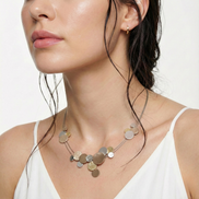 Divine Tri Tone Necklace with gold, silver, and coffee tones on adjustable chain