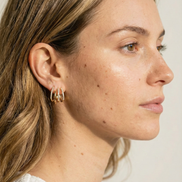 Forka Zircon Gold Earrings with white cubic zircons in gold plated brass and copper, 1cm length