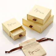 Diana Zircon Silver Bracelet packaging box and pouch set in beige with brown ribbon and logo