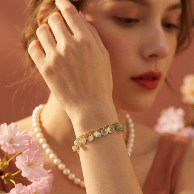 Green Shell Bracelet with natural green stones and gold-toned accents, adjustable fit for 15.5-20.5cm wrists
