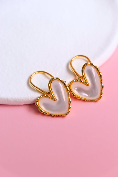 Gold hook earrings with white mother of pearl centerpiece and iridescent shimmer