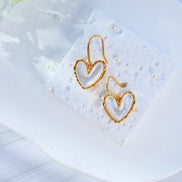 Gold hook earrings featuring white mother of pearl centerpiece with iridescent shimmer