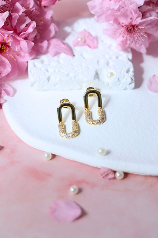 Remitta Zircon Gold Earrings with brass and copper base featuring a 19mm length and sparkling zircon stone