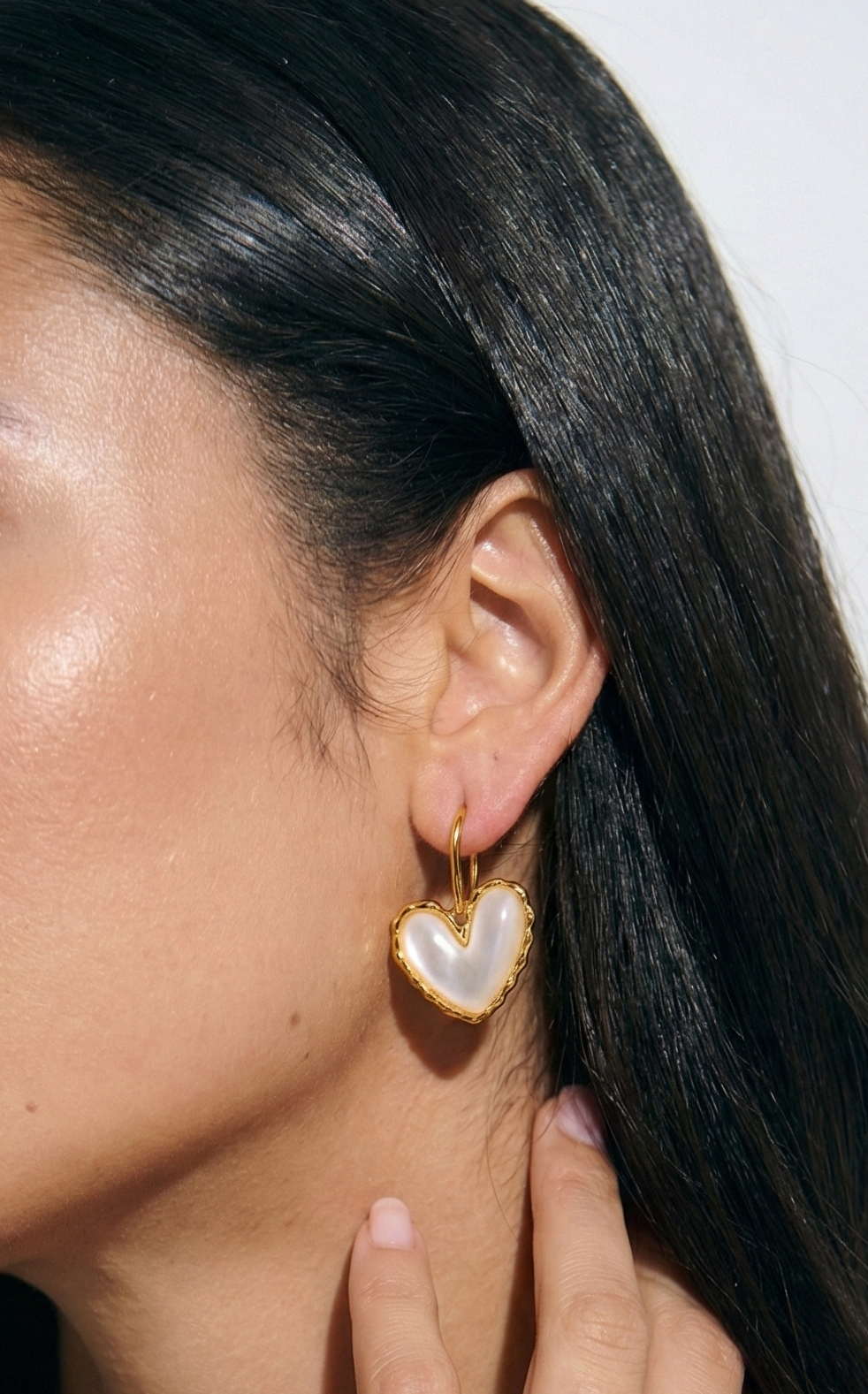 Lovia gold hook earrings with white mother of pearl centerpiece