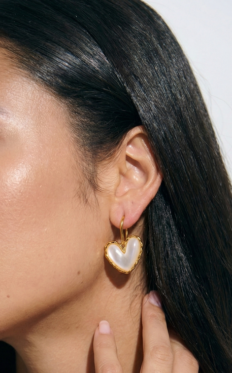 Lovia gold hook earrings with white mother of pearl centerpiece