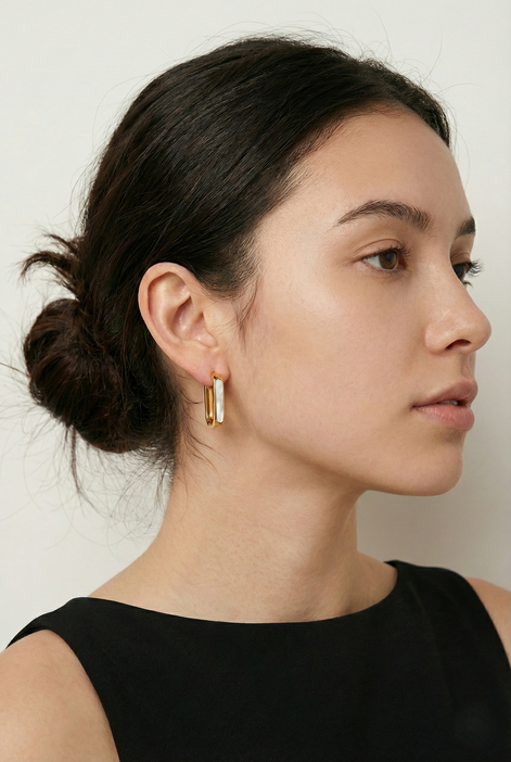 Ollie Mother Of Pearl gold earrings with iridescent mother of pearl on gold plated brass and copper base