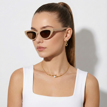 Woman wearing One Line Pearl Gold Necklace with gold-tone chain and single pearl pendant