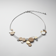 Divine Tri Tone Necklace with gold, silver, and coffee hues on adjustable chain